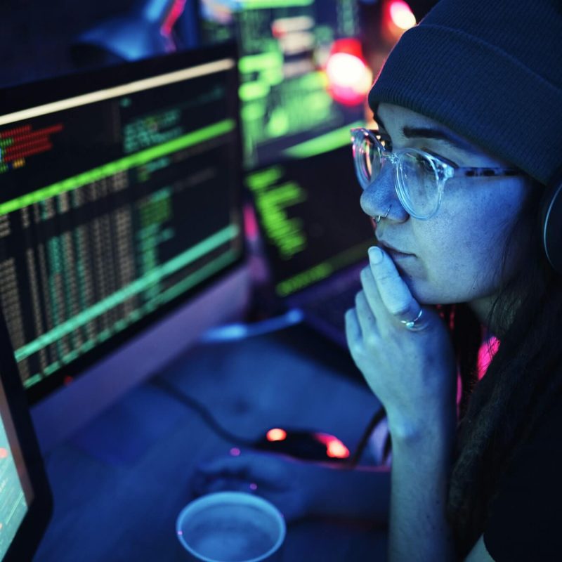 woman-computer-and-hacker-with-music-headphones-and-programming-for-cybersecurity-thinking-radio.jpg